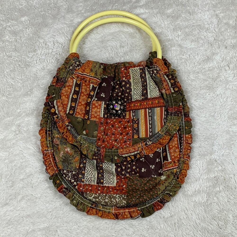 Handmade quilted round handle patchwork look hobo bag